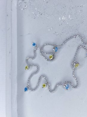 Фото Срібне кольє з жовто-блакитними фіанітами