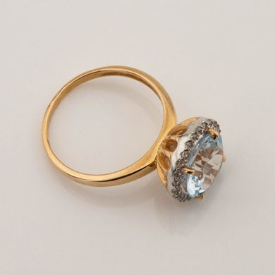 Фото Золотое кольцо с топазом и фианитами 111001top