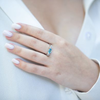 Фото Золотое кольцо с топазом и бриллиантами YZ11608